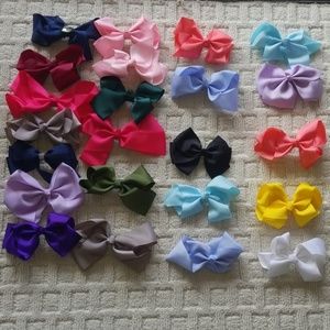 23 assorted hair ribbons/bows